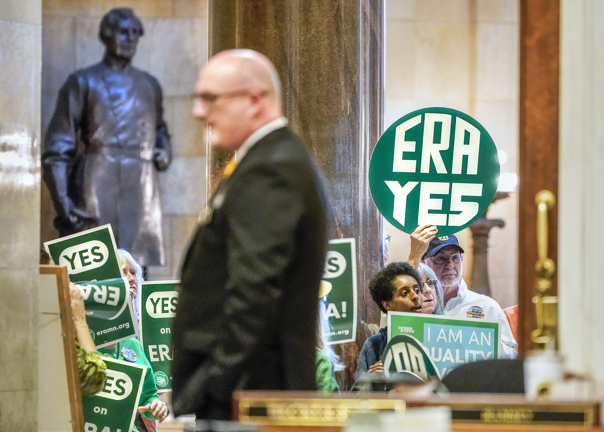 Supporters of a proposed equal rights constitutional amendment gather in front of the House Chamber Friday in anticipation of a floor vote on the bill later in the day. (Photo by Andrew VonBank)